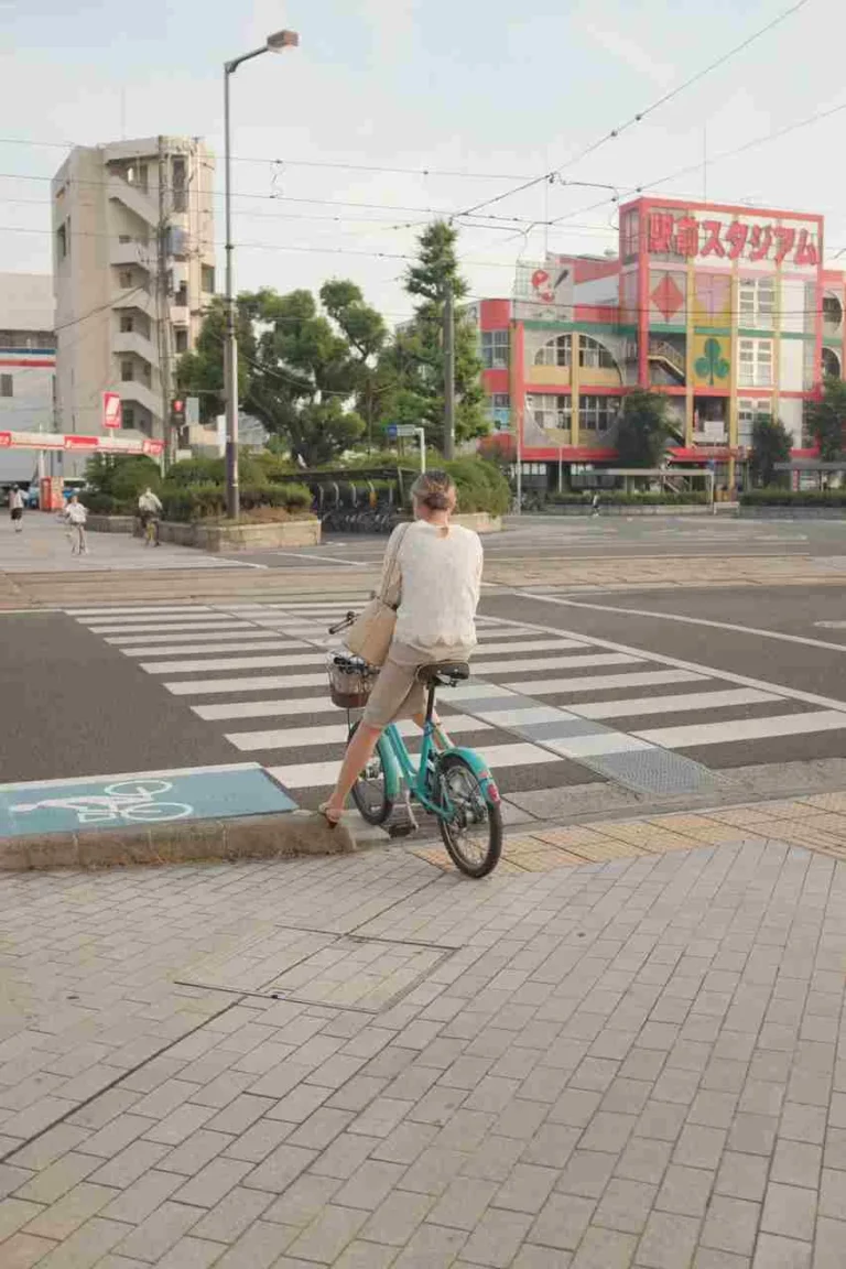 Female on bicycle crossing
