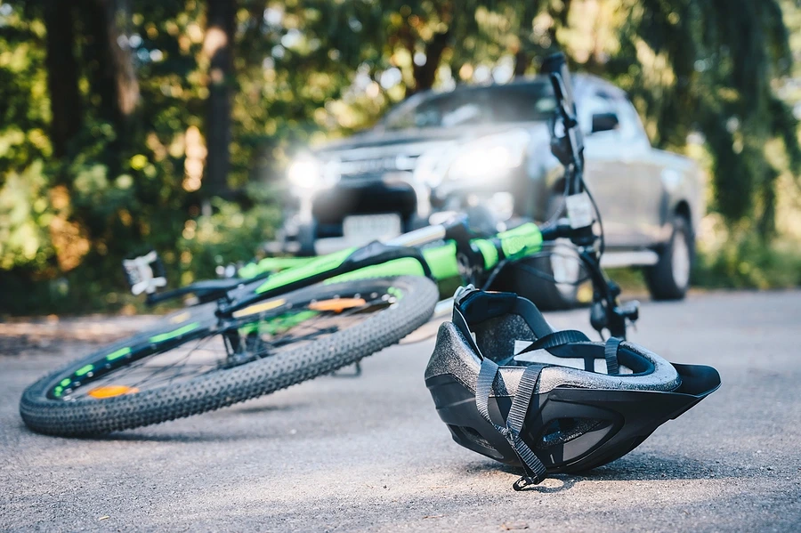 Bicycle and helmet fallen over